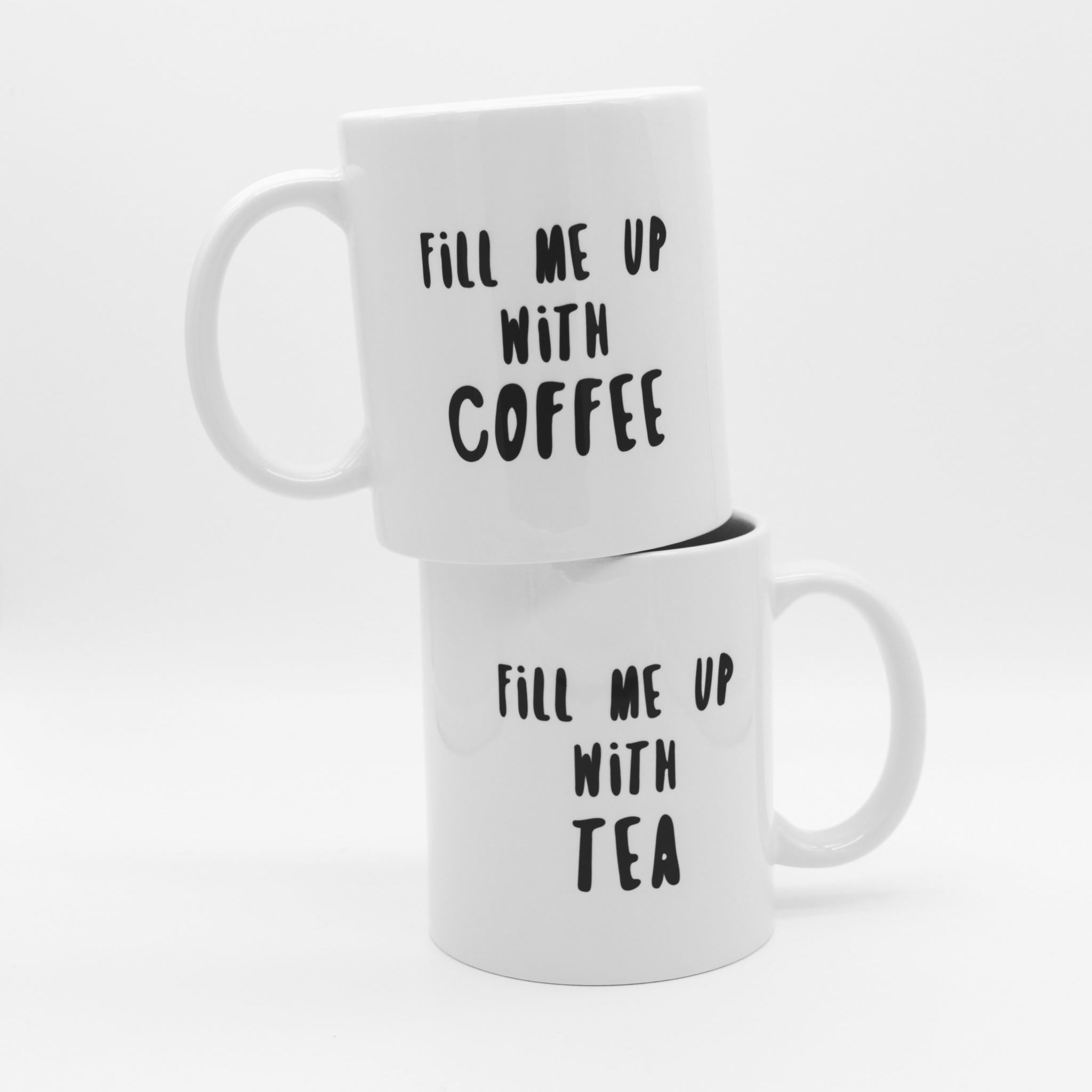 two white ceramic mugs
